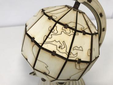 Earth globe with axis and rotating bracket in segment technology 